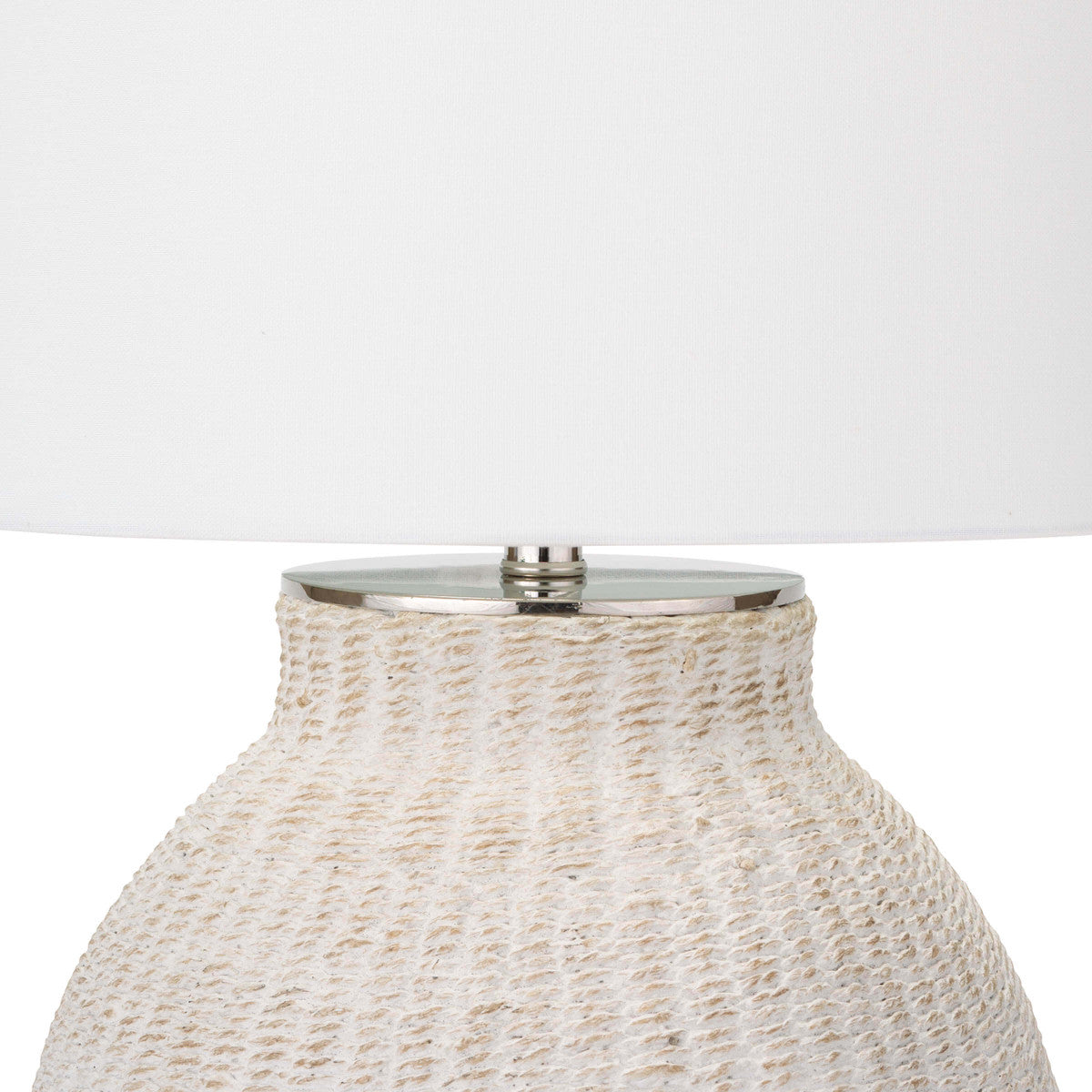 The Hobi Table Lamp has a gorgeous white-washed, natural woven pattern that catches our eye. The casual elegance in this lamp completes the look for any living room or bedroom.   Size: 18"w x 18"d x 26.5"h Material: Natural Material