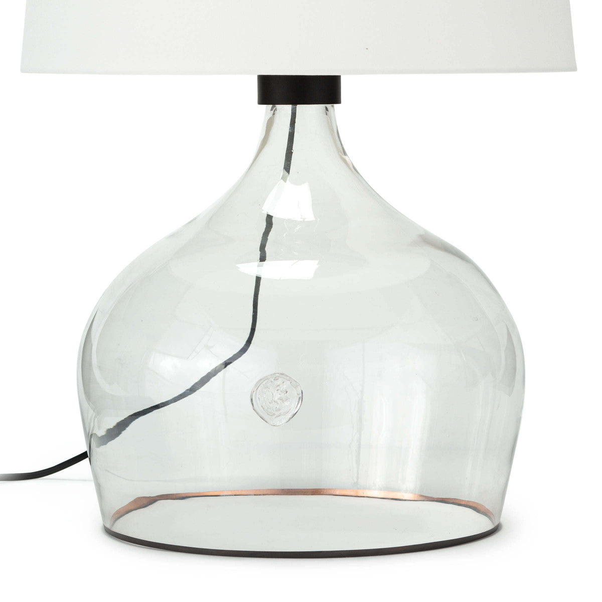 We love the stunning glass vessel on this Demi John Large Table Lamp. Add this in your living room or bedroom to give the room some refreshing character.   Size: 18"w x 18"d x 26.5"h Material: Glass