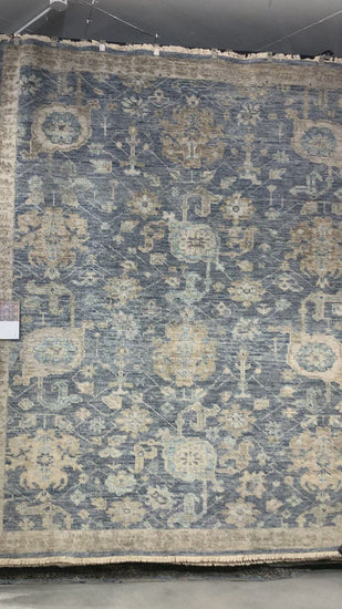The Helena Indigo / Taupe HEL-06 rug from Loloi is hand-knotted of 100% wool, refined, yet versatile for any home. The Helena rug combines weathered tones and worldly patterns for a beautiful grounding element in any room. Amethyst Home provides interior design, new construction, custom furniture, and rugs for the Des Moines and Cedar Rapids metro area.