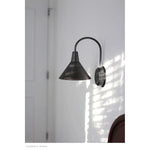 This Dublin Oil Rubbed Bronze Sconce has clean lines, creating a modern industrial look. These are the perfect sophisticated touch for any bedroom, kitchen, or hallway  Size: 7.75"w x 11"d x 13"h Material: Steel