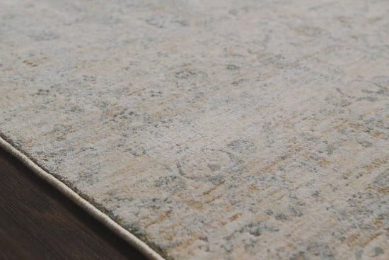 Our updated take on a classic. The Pandora Ivory/Mist Rug is power-loomed of 100% polyester, ensuring long-lasting durability, no shedding, and a soft feel underfoot.  The pile features a high to low texture, accentuating these timeless yet current designs. This rug is great for living rooms, bedrooms, or any room where you want cozy and comfortable texture on the floor!  Power Loomed 100% Polyester PAN-02 Ivory/Mist