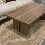 We love the rustic look of this Erie Coffee Table. Dark-smoked oak forms clean, structured lines, crafting the finest of coffee tables.   Overall Dimensions: 51.00"w x 27.50"d x 17.50"h