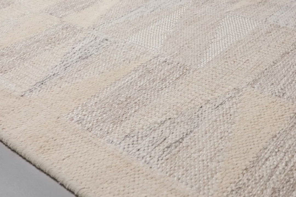 Hand-woven in India with a luxurious blend of wool, cotton, viscose, viscose from bamboo, chenille, acrylic and linen, this calming collection of contemporary neutral tones will add balance and warmth to any space.  Hand Woven 25% Wool | 20% Cotton | 18% Viscose from Bamboo | 21% Viscose | 8% Chenille | 5% Acrylic | 3% Linen India EVE-01 Natural