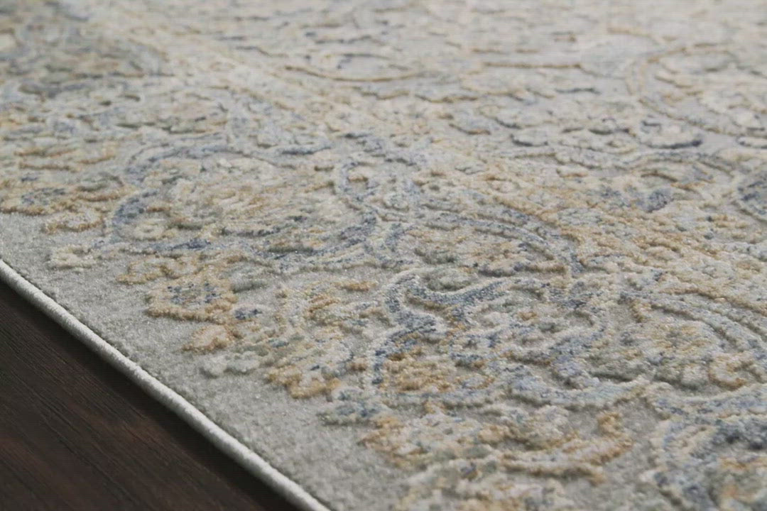 Our updated take on a classic. The Pandora Stone / Gold Area Rug is power-loomed of 100% polyester, ensuring long-lasting durability, no shedding, and a soft feel underfoot.  The pile features a high to low texture, accentuating these timeless yet current designs. This rug is great for living rooms, bedrooms, or any room where you want cozy and comfortable texture on the floor!  Power Loomed 100% Polyester PAN-01 Stone/Gold