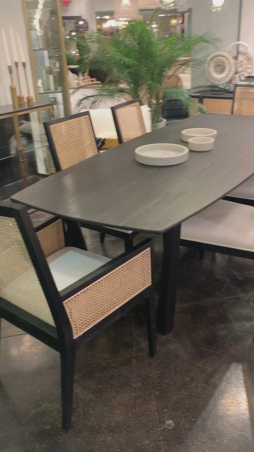 We love the airy base of this Caesar Dining Table. Made of teak wood, this is a sturdy table to add to any dining room or kitchen area.  Teak wood Antique black finish Size: 95"l x 40"d x 33"h 