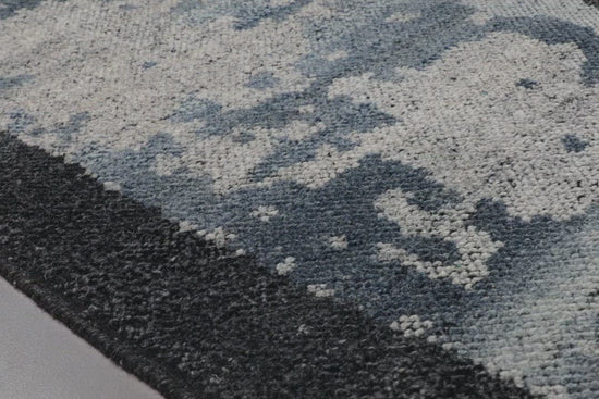 The Sumi Collection is hand-knotted of wool pile by artisans in India, with a moody and beguiling mix of stormy blues and greys. Bring a new level of sophistication to any room with its wide brushstrokes of color and refined design.  Hand Knotted 100% Wool Pile SUM-04 Mist / Onyx