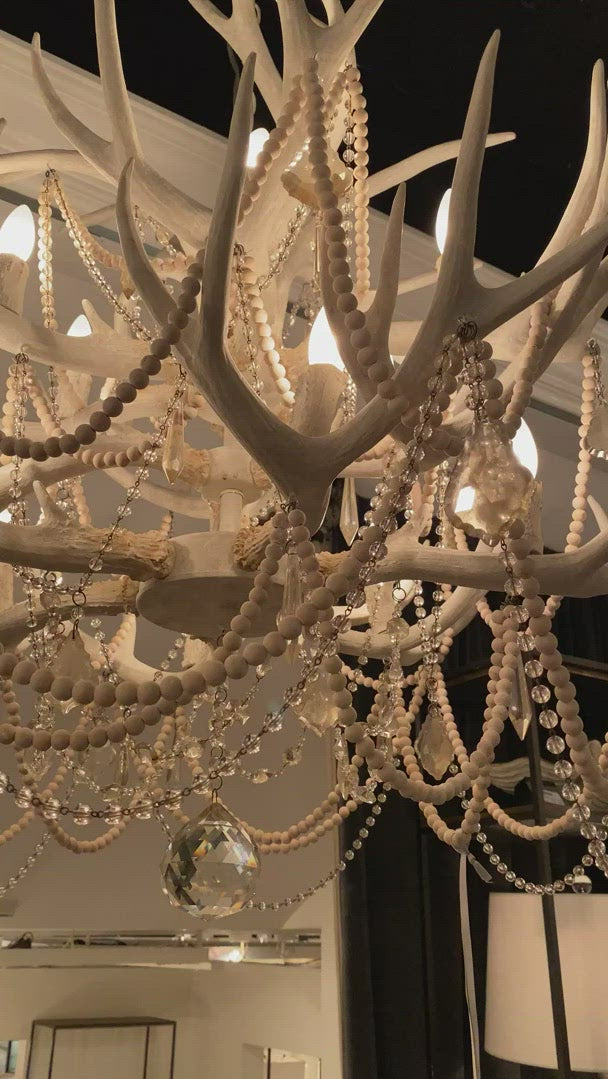 Rustic meets luxe vibe with this Cheyanne Antler Chandelier by Regina Andrew. The antlers matched with the tea stained crystals make a statement in any living room, entryway or other area needing extra light. 