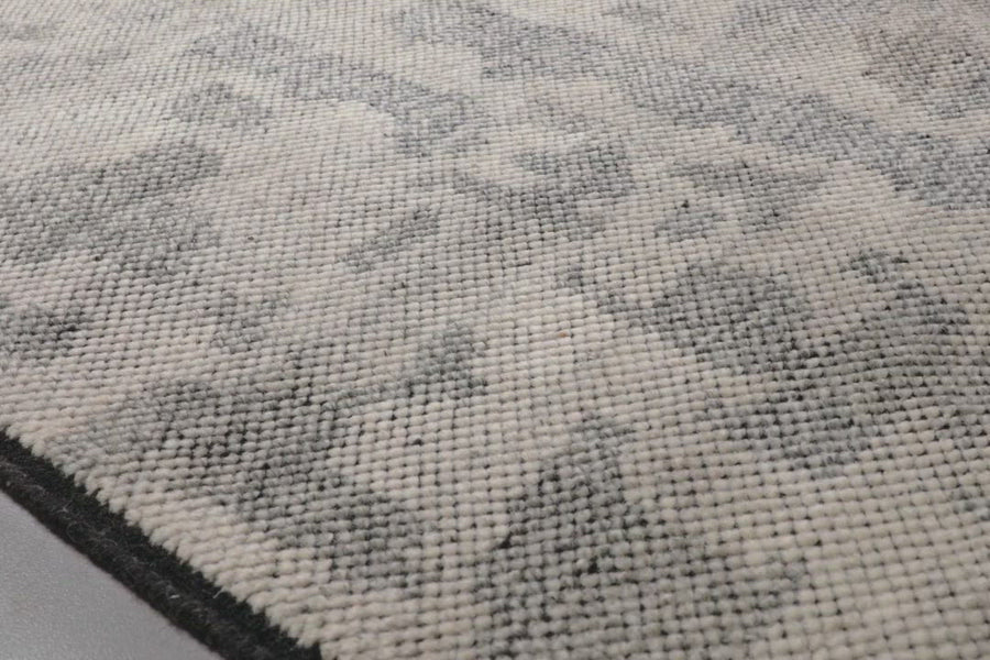 The Sumi Collection is hand-knotted of wool pile by artisans in India, with a moody and beguiling mix of stormy blues and greys. Bring a new level of sophistication to any room with its wide brushstrokes of color and refined design.  Hand Knotted 100% Wool Pile SUM-02 Neutral / Black