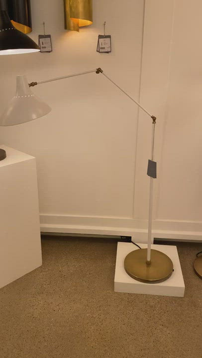 The Charlton Floor Lamp by Visual Comfort has a three points of movement and is the perfect lamp for your desk, living room, or other area needing extra lighting.   Designer: AERIN