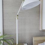 We love the hand-rubbed antique brass matched with either plaster white or black in this Charlton Table Lamp. This is the perfect lamp for your office, bedroom, or other space needing controlled light.   Designer: AERIN