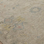 The Legacy Oatmeal / Multi rug from Loloi is hand-knotted, refined, yet versatile for any home. The Legacy rug is deliberately distressed and sheared down to an extra low pile of 100% wool, creating a patina usually only imparted through decades of wear.  This rug features: - Beautiful vintage look and patina - Extra low pile - Easy to clean and maintain - Perfect for living and dining rooms, hallways, and extra large spaces  Hand-Knotted 100% Wool LZ-09 Oatmeal / Multi