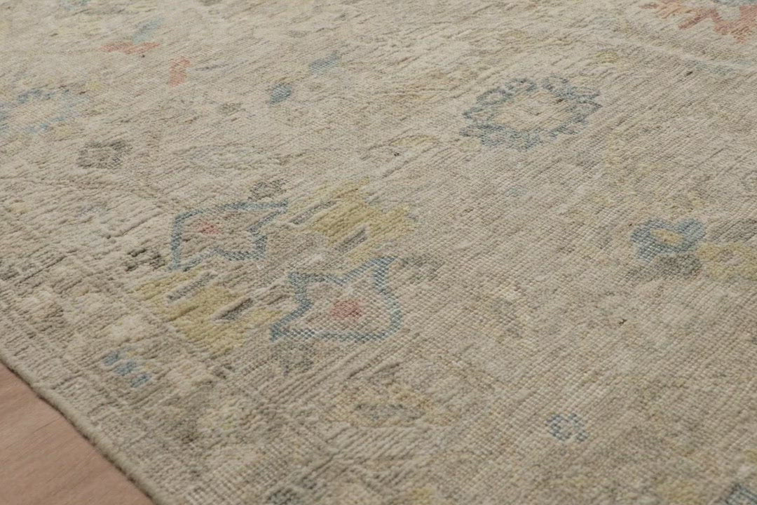The Legacy Oatmeal / Multi rug from Loloi is hand-knotted, refined, yet versatile for any home. The Legacy rug is deliberately distressed and sheared down to an extra low pile of 100% wool, creating a patina usually only imparted through decades of wear.  This rug features: - Beautiful vintage look and patina - Extra low pile - Easy to clean and maintain - Perfect for living and dining rooms, hallways, and extra large spaces  Hand-Knotted 100% Wool LZ-09 Oatmeal / Multi