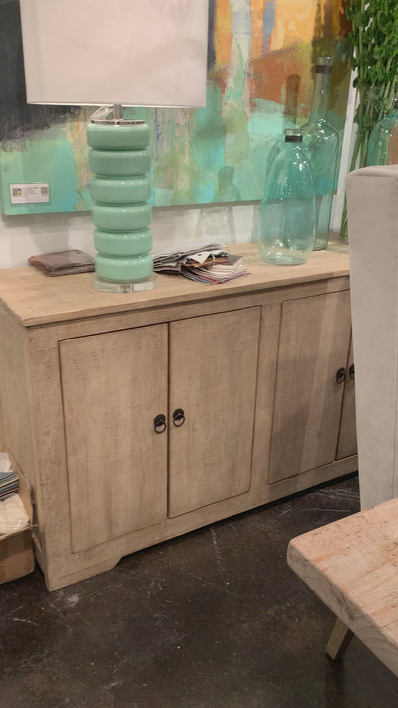 This Nico Sideboard provides ample storage for keeping dinnerware and table linens within easy reach -- a piece that is sure to stand out at every dinner party and holiday meal!