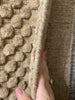 Natural beauty is expressed in an understated fashion with the Hadley Dune Area Rug, an eco-friendly collection of wool, cotton, and polyester. Loom-knotted in India, Hadley features an intriguing cut pile and loop combination which adds distinctive texture to these handsome and durable designs. Also, the muted colors fit easily with a variety of interior styles while still earning notice with raw elegance.  Hand Loomed 64% Wool | 22% Cotton | 9% Polyester | 5% Other Fibers HD-02 Dune