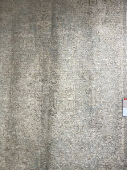 Hand-woven by skilled artisans, the Priya Ocean / Ivory Area Rug from Loloi offers beautiful tonal designs accentuated by a carefully curated color palette in tones of taupe, ivory, and brown. Delicate yet strong, the Priya is blended with wool, cotton, and more and an instant classic made for today's home.