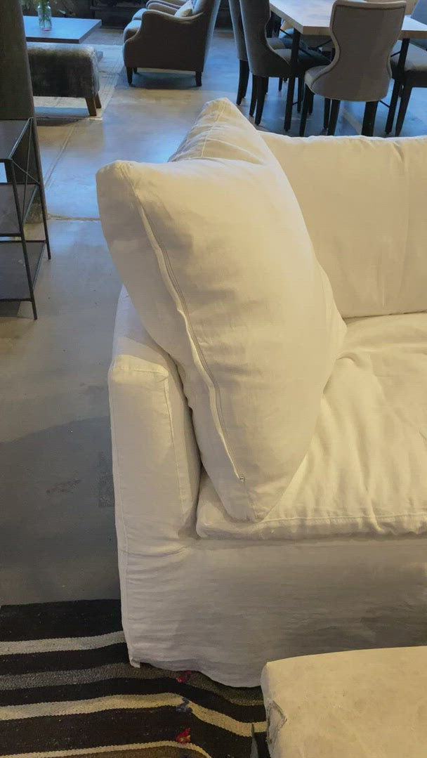 This cozy Havana Sofa from Cisco Brothers is a wonderful addition to any room. The sofa features a gorgeous rounded frame with a slight taper to the front. This was instant swoon when we saw this at market. As shown slipcovered in Mariet White 100% linen fabric. 