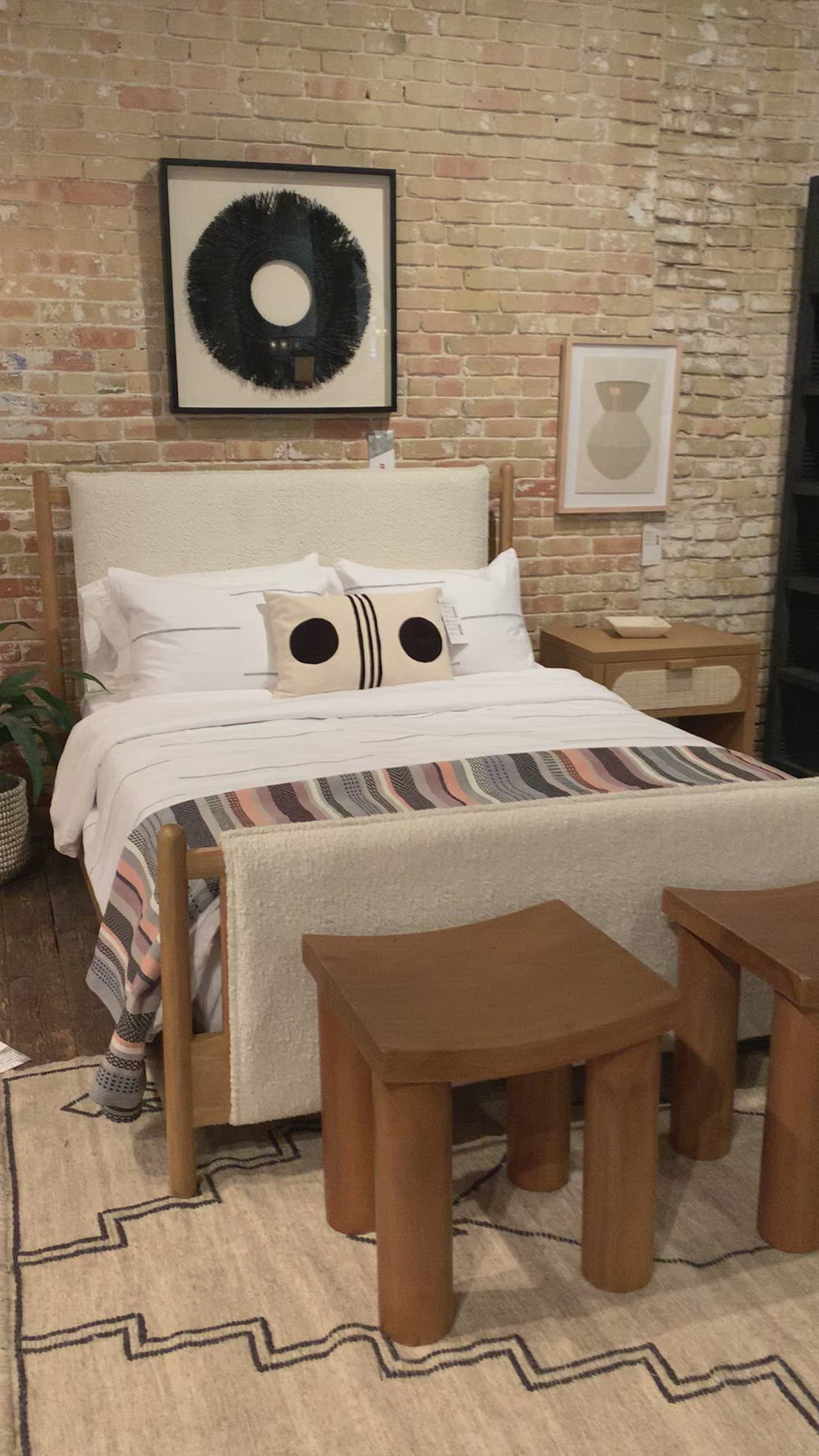 Bring a cozy hygge vibe to the bedroom with this textured Bowen Bed. Framed by light-finished solid oak, a sling-style bed features faux shearling head and foot boards -- sure to elevate any bedroom.   Queen Overall Dimensions: 64.25"w x 87.25"d x 48.00"h King Overall Dimensions: 80.25"w x 88.50"d x 48.00"h