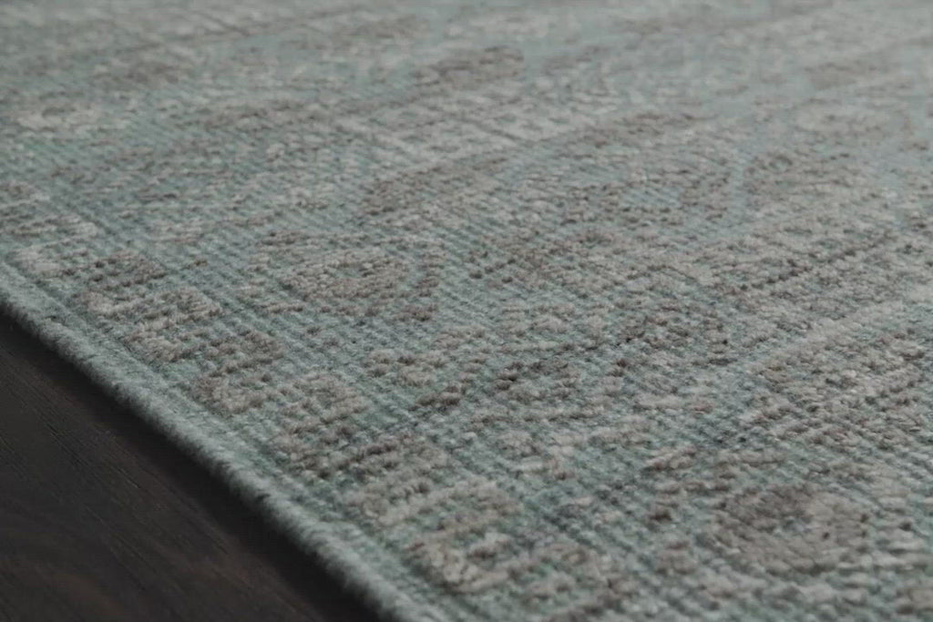 Both timeless and modern, the Idris area rug collection from Loloi is meticulously hand-knotted of viscose and wool. The tonal series features an elevated texture, accentuating the pattern in every piece.  Hand-Knotted 70% Viscose | 30% Wool ID-03 Ocean/Smoke