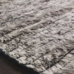 A nod to timeless Moroccan style, the Khalid Pewter/Ink Area rug is hand-knotted in India by skilled artisans. The soft pile features 100% natural, undyed wool, lending slight variations in tones that make each piece it's own. Plus, each rug is finished with a thoughtfully designed fringe.  Hand-Knotted 100% Wool KF-04 Pewter/Ink