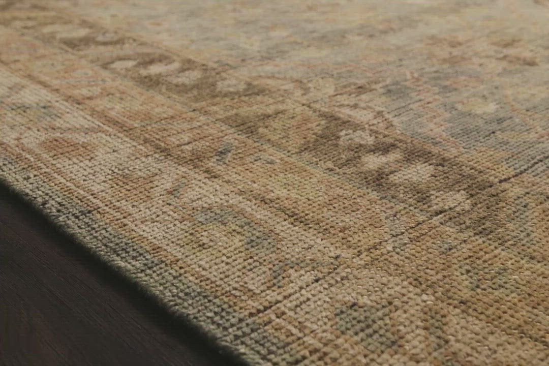Bring a touch of antiqued beauty into your home with the Heirloom Aqua / Terracotta HQ-04 rug from Loloi. This wool rug tastefully honors the art of hand knotted rugs. This rug would be perfect for a living room, dining room, bedroom, hallway or kitchen runner with it's patterns and calming tones for your home.