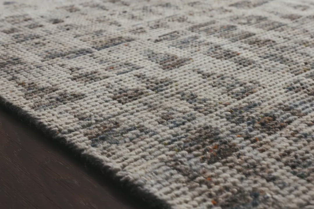 Hand-knotted in India of 100% wool, the Amara Natural/Ocean Area Rug creates a casual yet refined vibe with high-end appeal. Showcase in your living room, bedroom, entryway, or other high traffic area.   Hand Knotted 100% Wool AMM-07 Natural/Ocean