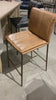 We the love the sleek look the tan top grain leather brings to this Mayer Bar + Counter Stool - Tan -- the perfect stool for any kitchen or bar area. 