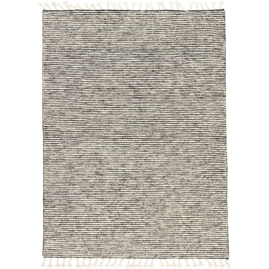 Inspired by rugs from the Tullu region in Morocco, the Alpine II Rug from Jaipur Living brings together heathered solids for a gorgeous rug. The hand-knotted 100% wool rug's high pile brings warmth and coziness to any living room or bedroom with soft colors of ivory and grey.