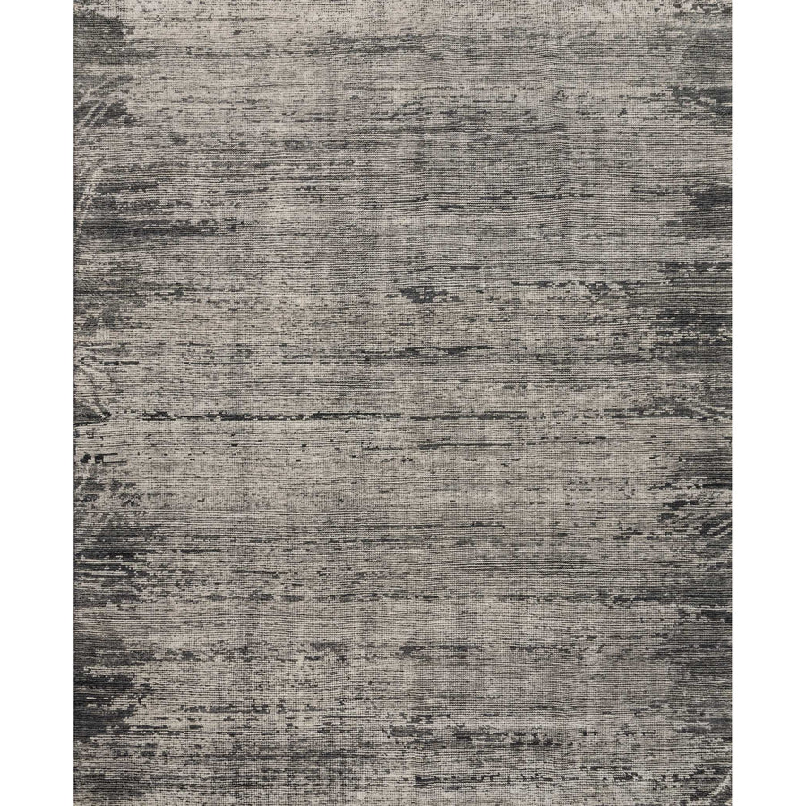 Hand-knotted in India of 100% wool, the Amara Collection creates a casual yet refined vibe with high-end appeal. Available in sizes up to 11’6'' x 15’.  Hand Knotted 100% Wool AMM-02 Silver/Dark Grey