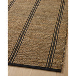 Featuring Angela Rose x Loloi Colton Natural / Black Rug by Loloi at Amethyst Home. The Angela Rose x Loloi Colton Natural / Black rug is a new take on the staple jute rug, blended with cotton for added softness. In a range of linear designs in modern earth tones, Colton can add visual interest to a room or serve as a gently textured neutral. This collection is hand-woven in India and GoodWeav. Amethyst Home provides interior design services, furniture, rugs, and lighting in the Boston metro area.