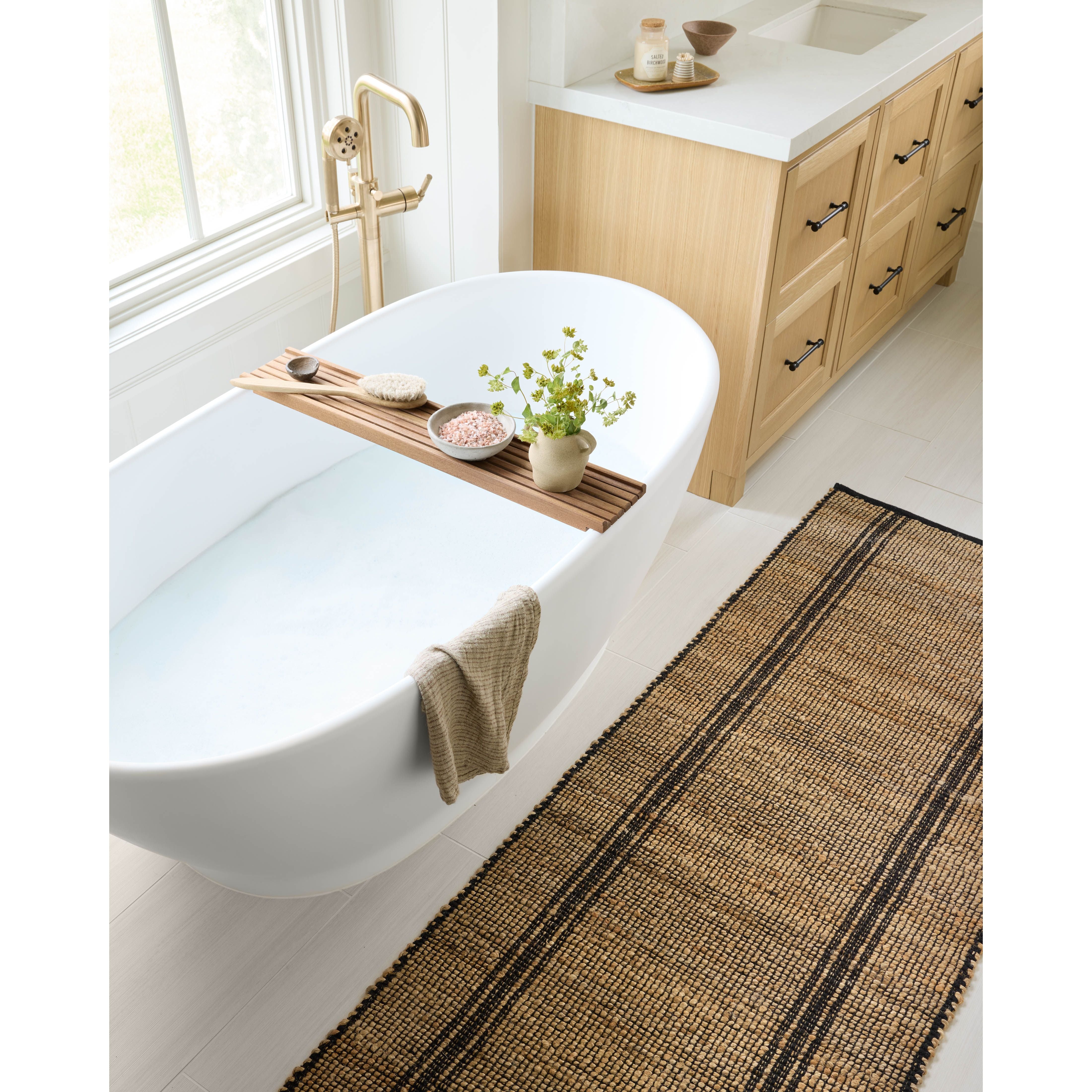 Featuring Angela Rose x Loloi Colton Natural / Black Rug by Loloi at Amethyst Home. The Angela Rose x Loloi Colton Natural / Black rug is a new take on the staple jute rug, blended with cotton for added softness. In a range of linear designs in modern earth tones, Colton can add visual interest to a room or serve as a gently textured neutral. This collection is hand-woven in India and GoodWeav. Amethyst Home provides interior design services, furniture, rugs, and lighting in the Denver metro area.