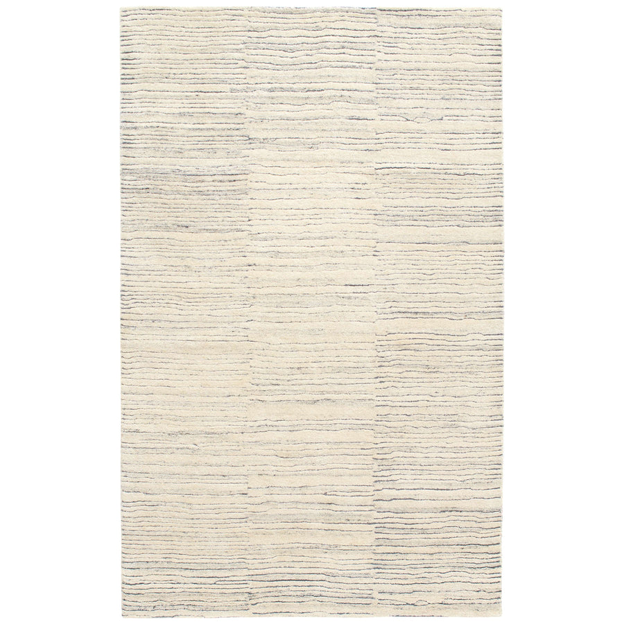 Inspired by substrate layers of sandstone sediments that chronicle the millennia, this luxurious, irregularly striped wool rug will stand the test of time. The subtle degradations of a natural undyed fleece pile enhance the finely observed irregular striping in a softly mineral palette. The subtle beauty of the higher sheared tufts emphasizes the contrast of the densely looped stripes. Amethyst Home provides interior design, new construction, custom furniture, and area rugs in the Nashville metro area.