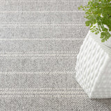 Rugged meets refined in this flat twill weave with a blown-out ticking stripe. For versatility and comfort, you can't beat our innovative designs in wonderful washable wool-like P.E.T. fibers. Amethyst Home provides interior design, new construction, custom furniture, and area rugs in the Calabasas metro area.