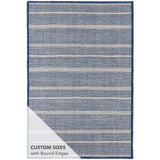 Part of our Bunny Williams collection, this delicately striped, navy indoor/outdoor rug was inspired by an antique rug sample from the designer's own personal collection. Due to the handmade nature of this area rug, variations in color are expected. Dhurrie rugs are woven to be lightweight, low profile and reversible. Amethyst Home provides interior design, new construction, custom furniture, and area rugs in the Seattle metro area.
