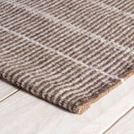 Part of our Designer Favorites collection of go-to rugs in timeless styles and a variety of durable constructions.<br><br>Part of our Bunny Williams collection, this delicately striped, dark brown indoor/outdoor rug was inspired by an antique rug sample from the designer's own personal collection. Due to the handmade nature of this area rug, variations in color are expected. Amethyst Home provides interior design, new construction, custom furniture, and area rugs in the Austin metro area.