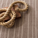 Part of our Designer Favorites collection of go-to rugs in timeless styles and a variety of durable constructions.<br><br>Part of our Bunny Williams collection, this delicately striped, dark brown indoor/outdoor rug was inspired by an antique rug sample from the designer's own personal collection. Due to the handmade nature of this area rug, variations in color are expected. Amethyst Home provides interior design, new construction, custom furniture, and area rugs in the Laguna Beach metro area.