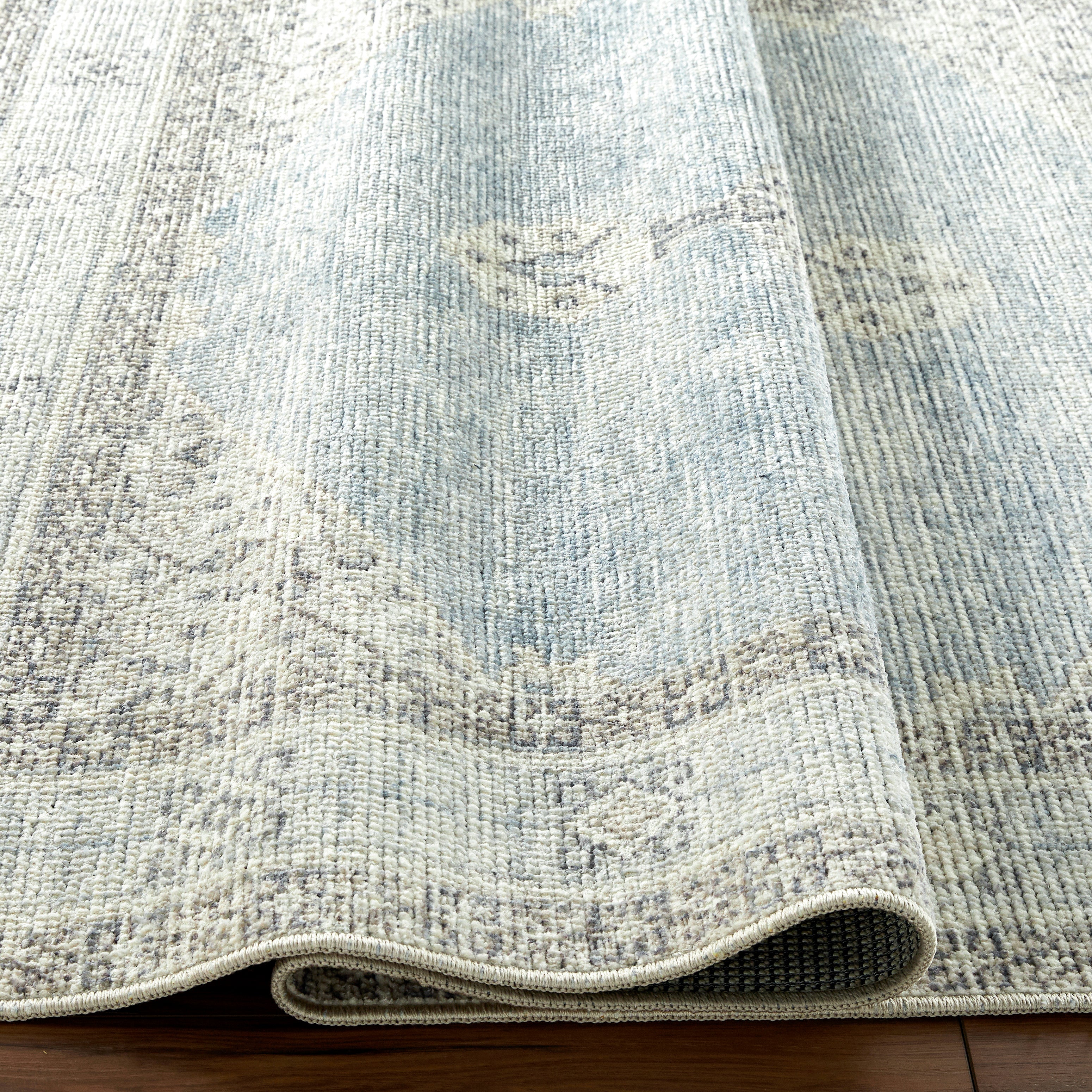Brought to you by Becki Owens x Surya, the Lila Denim medallion area rug combines rich, detailed design with warm soft neutrals and tones to create an inviting space that will always feel familiar. Amethyst Home provides interior design, new construction, custom furniture, and area rugs in the Boston metro area.