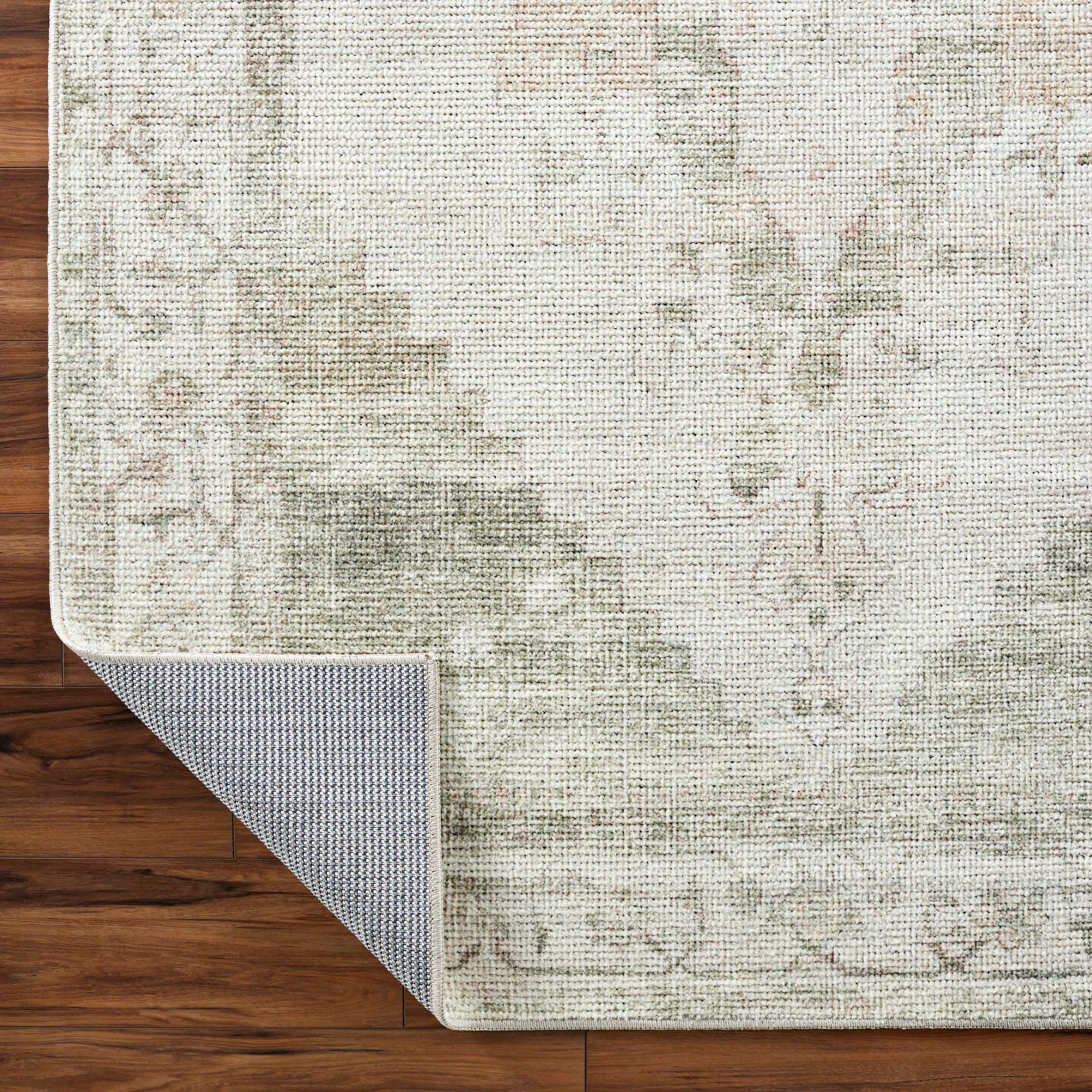 The Luca Olive Medallion Rug from Becki Owens x Surya is a vintage inspired collection full of rich design and subtle versatile colors that will bring a curated and collected feel to any room. Amethyst Home provides interior design, new construction, custom furniture, and area rugs in the Newport Beach metro area.
