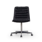 Paired back and fashion-forward, this minimalist Malibu Desk Chair in black top-grain leather offers maximum comfort. Inspired by workspaces of the ‘50s and ‘60s. Stainless steel casters make for stylish ease in the workplace. Height not adjustable.  Overall Dimensions: 20.75"w x 26.25"d x 34.25"h Seat Depth: 16.54" Seat Height: 19.29"