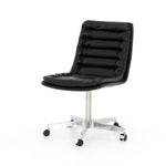Featuring Malibu Desk Chair - Rider Black by Four Hands at Amethyst Home. Paired back and fashion-forward, this minimalist Malibu Desk Chair in black top-grain leather offers maximum comfort. Inspired by workspaces of the ‘50s and ‘60s. Stainless steel casters make for stylish ease in the workplace. Height not adjustable.
Overall Dimensions: 20.75"W x 26..  Amethyst Home provides interior design, new home construction design consulting, vintage area rugs, and lighting in the Alpharetta metro area.