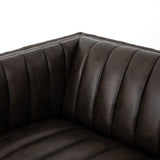 Luxurious top-grain leather seating takes on a deep brown hue with dramatic channeling, for trend-forward texture and sumptuous sit with this Augustine Deacon Wolf 97" Sofa.  Size: 97"w x 35"d x 26.5"h Seat Depth: 24" Seat Height: 16.5" Arm Height from Floor: 26" Arm Height from Seat: 9.5"