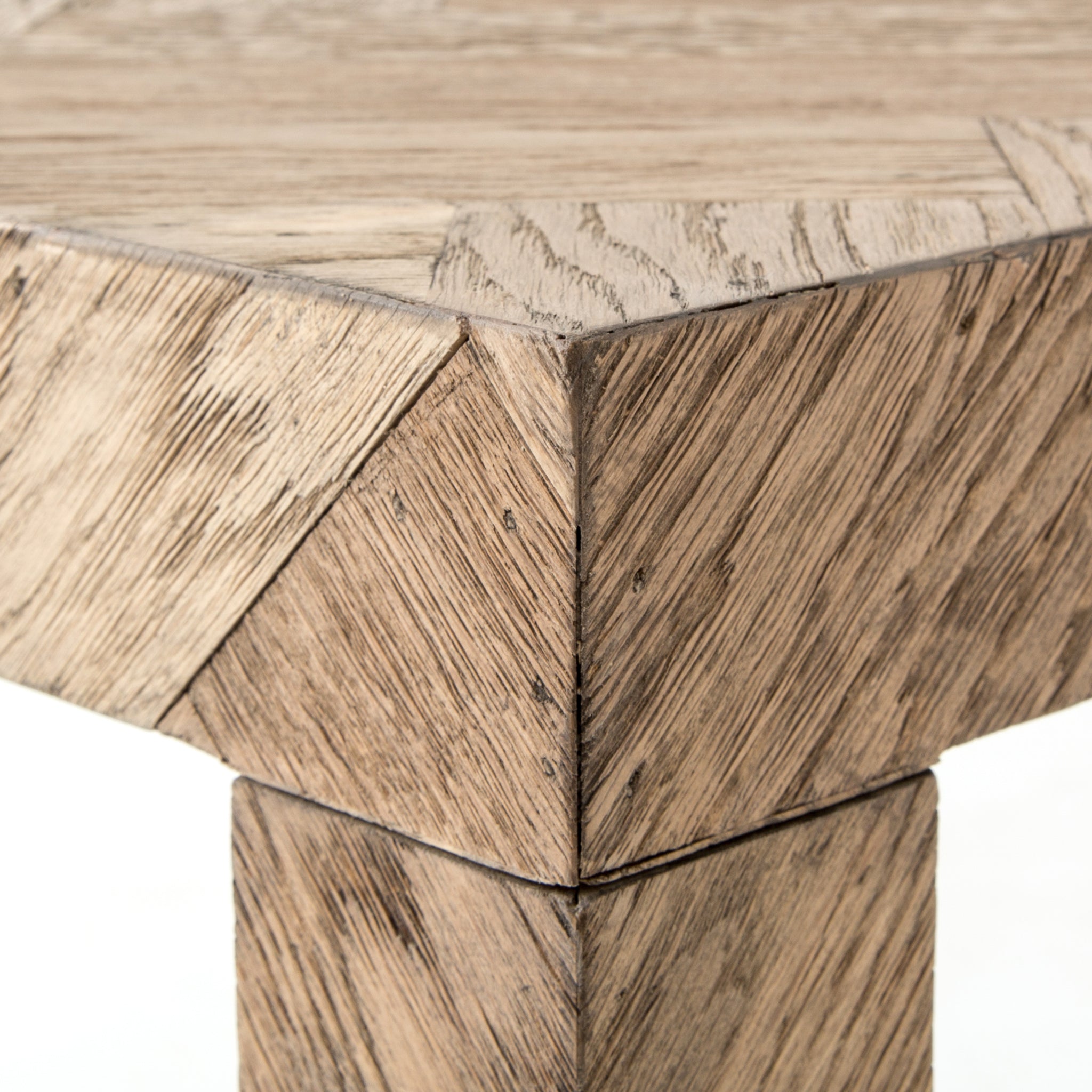 The simplest answer is often the right one. This deceptively simple Parsons-style table offers grandly exaggerated dimensions and a subtle, herringbone parquet pattern on every surface.   Overall Dimensions: 70.75"w x 19.75"d x 31.50"h  