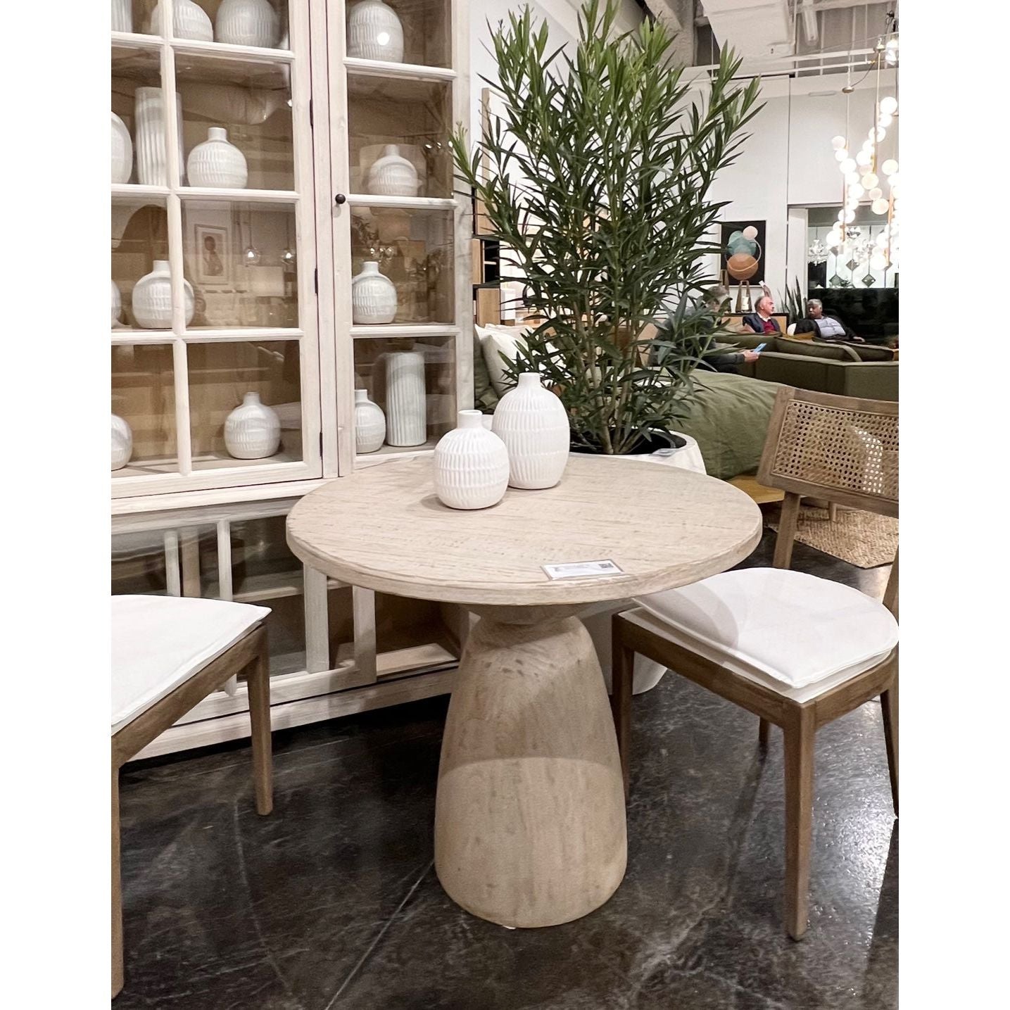 We love the curves and structure of this Cabrera Bistro Table. It is meticulously finished by hand, therefore there may be slight variations in color. Making each piece one-of-a-kind. Amethyst Home provides interior design services, furniture, rugs, and lighting in the Malibu metro area.