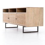 We love the organic feel of this Carmel Natural Mango Media Console. The shelves and posterior cord management make this the perfect media console for families wanting extra storage, while also adding a mid-century look to the room.   Size: 65"w x 18"d x 24"h  Materials: Mango Wood, Cane, Iron