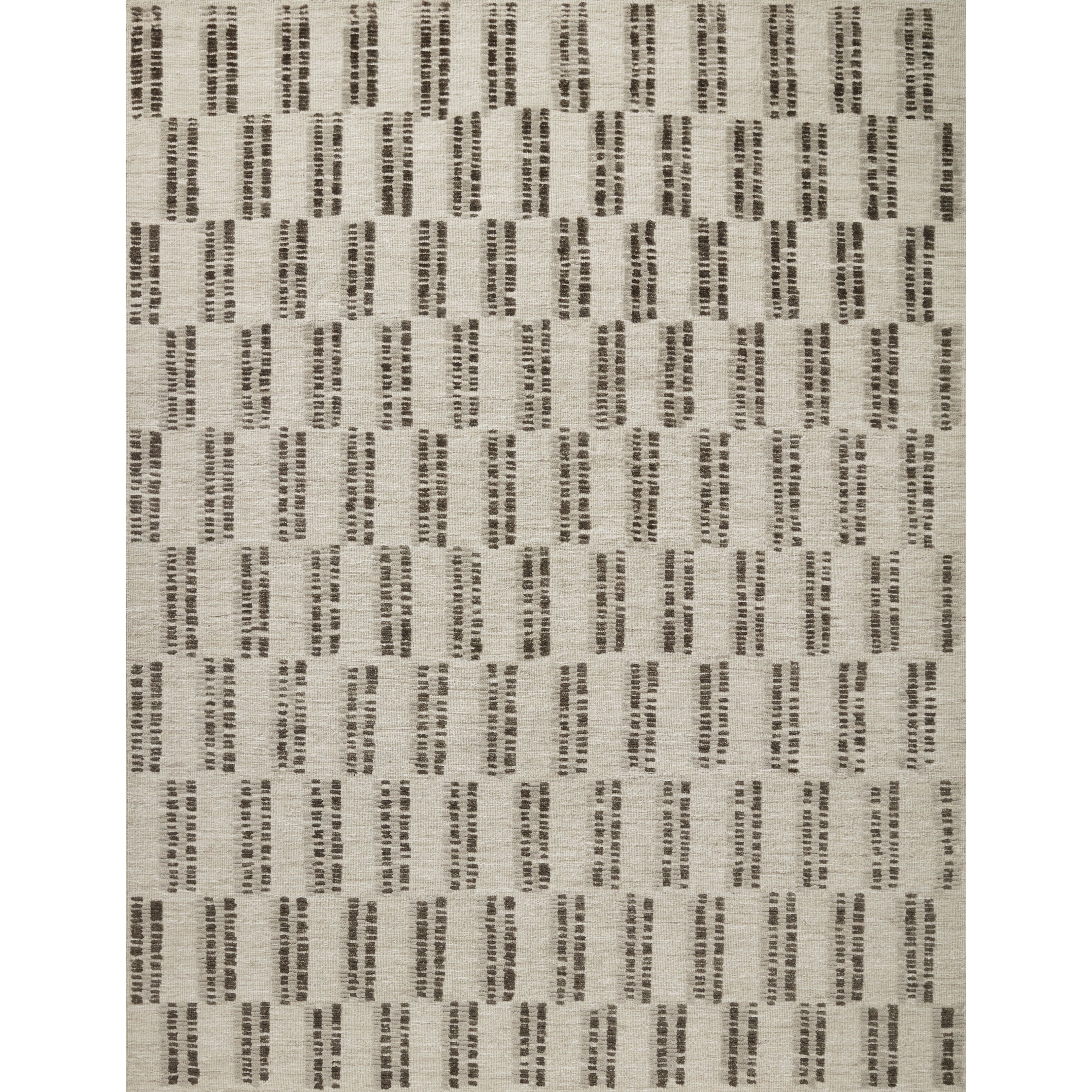 The Carrier & Company x Loloi Harrison Beige / Charcoal Rug is a playful selection of high/low pile, where the patterns are expressed through the weaves. Linear patterns help create order and clarity in a room, and the repetition in the patterns creates a pleasant energy.