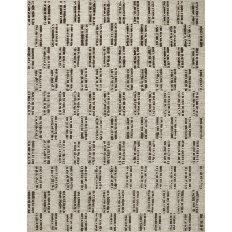 The Carrier & Company x Loloi Harrison Beige / Charcoal Rug is a playful selection of high/low pile, where the patterns are expressed through the weaves. Linear patterns help create order and clarity in a room, and the repetition in the patterns creates a pleasant energy.