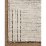 The Moore Collection for Carrier and Company x Loloi is a sophisticated area rug with a subtle interplay of higher, lighter tone pile above a deeper-toned base pile. Abstract geometric patterns in airy, neutral palettes create a sense of freshness and textured dimension that the design firm is known for, especially against the rug’s striped base. AmethystHome provides interior design, new construction, custom furniture, and rugs for Des Moines metro area