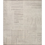 The Moore Collection for Carrier and Company x Loloi is a sophisticated area rug with a subtle interplay of higher, lighter tone pile above a deeper-toned base pile. Abstract geometric patterns in airy, neutral palettes create a sense of freshness and textured dimension that the design firm is known for, especially against the rug’s striped base. AmethystHome provides interior design, new construction, custom furniture, and rugs for Winter Garden metro area