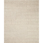 The Moore Collection for Carrier and Company x Loloi is a sophisticated area rug with a subtle interplay of higher, lighter tone pile above a deeper-toned base pile. Abstract geometric patterns in airy, neutral palettes create a sense of freshness and textured dimension that the design firm is known for, especially against the rug’s striped base. AmethystHome provides interior design, new construction, custom furniture, and rugs for Boston metro area