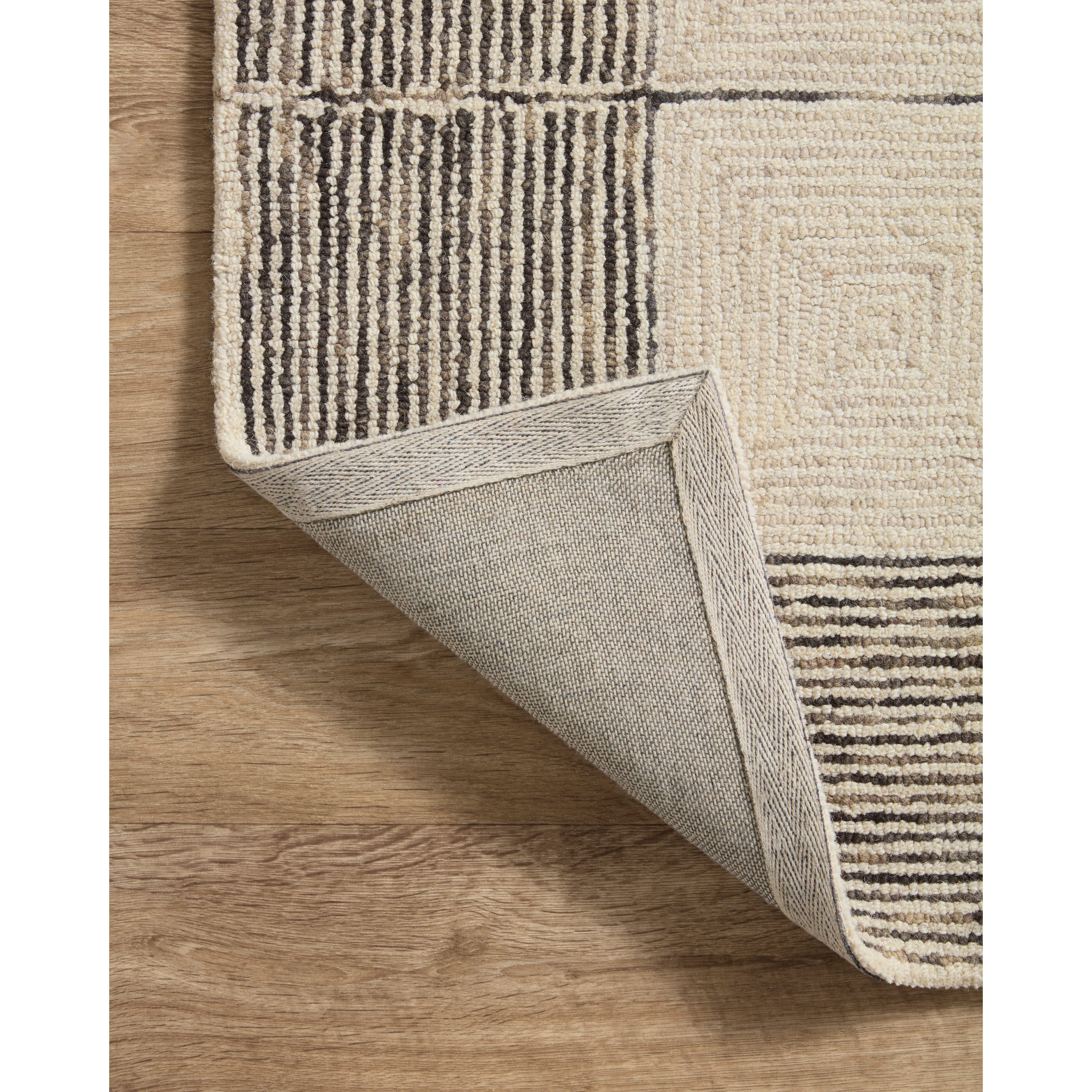 Featuring Chris Loves Julia x Loloi Francis Cream / Black Rug by Loloi at Amethyst Home. The unboring neutral. Picture perfect — we love the way this rug frames your furnishings.
It’s no coincidence that the pattern of the Francis Cream / Black rug for Chris Loves Julia x Loloi may remind you of tilework—it’s based on favorite flooring patterns of the couple, from tilework to parquet flooring. Amethyst Home provides interior design services, furniture, rugs, and lighting in the Seattle metro area.