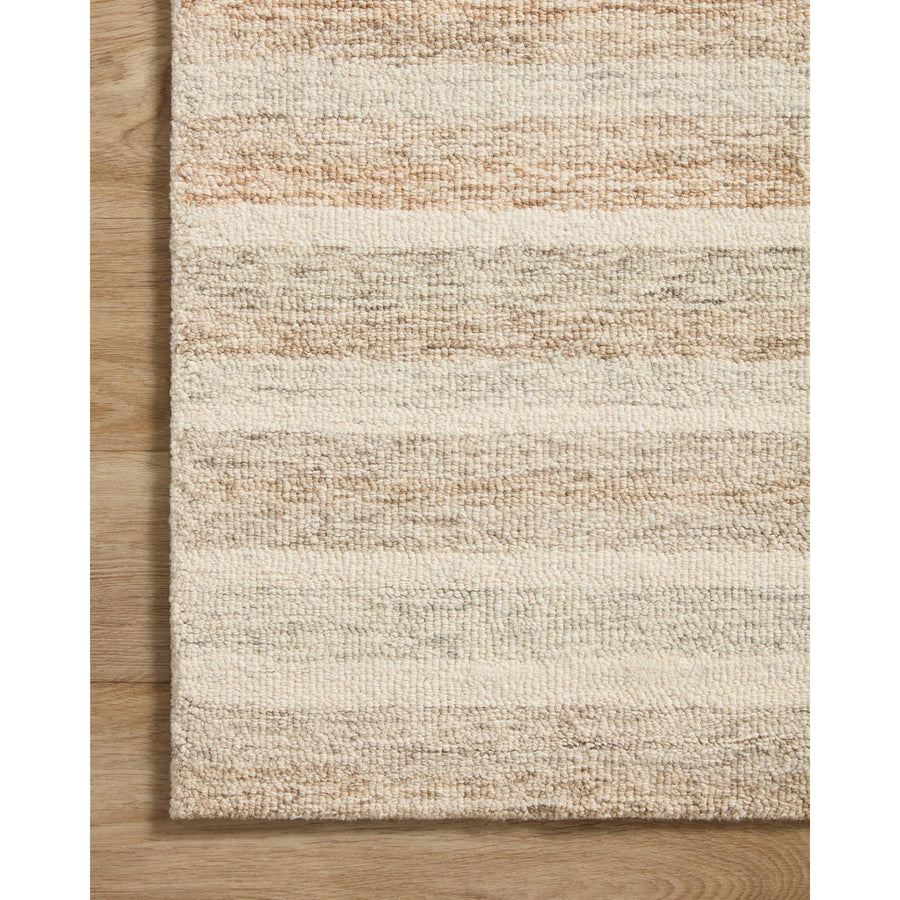 The subtle, warm tonal patterns remind us of our favorite California cool hemp rugs. Known for its durability, the Chris Ivory / Clay hooked wool rug is a smart choice for any room in your home that gets lots of love. Amethyst Home provides interior design services, furniture, rugs, and lighting in the Calabasas metro area.